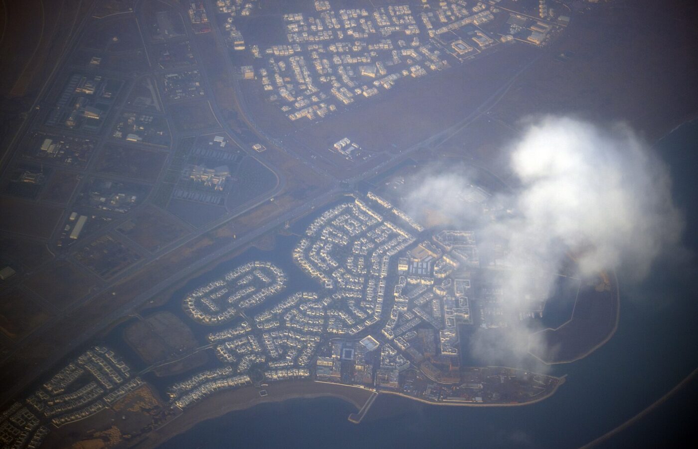 Aerial view of a marina development on the Muscat coast